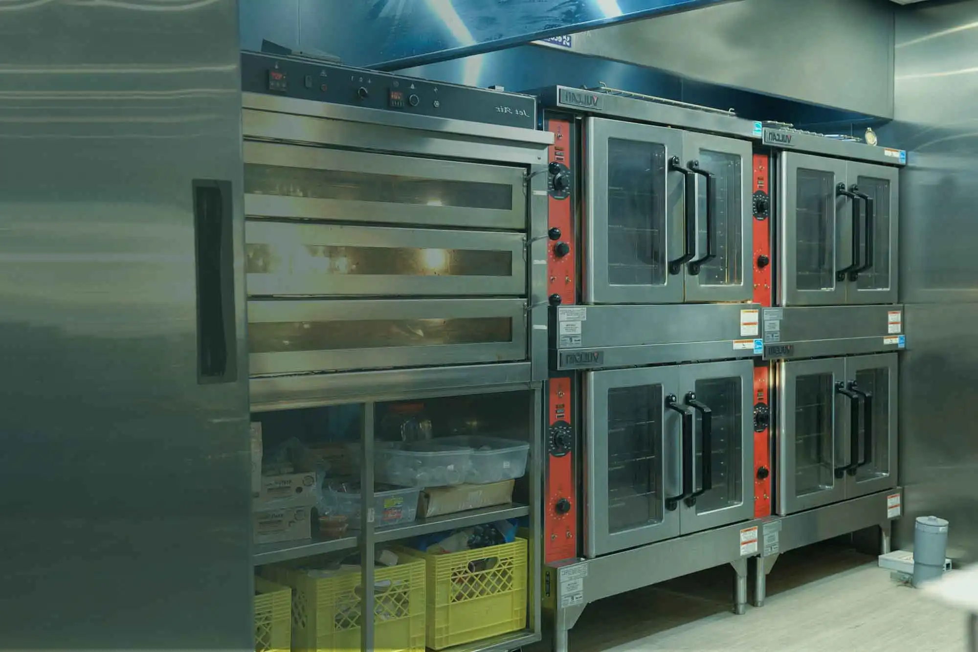 Professional chefs preparing food in a commercial kitchen